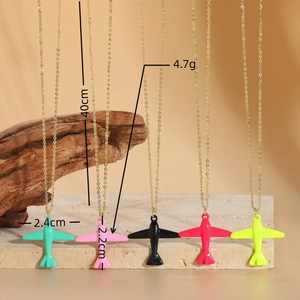 Golden airplane pendant necklaces in multiple colors for stylish fashion accessories