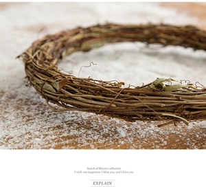 Macro view of natural rattan vine base for DIY Christmas wreath on wooden surface