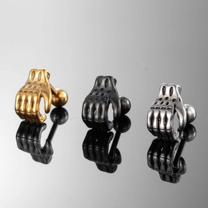 Trois boucles d'oreilles punk main de squelette en métal doré noir et argent brillant