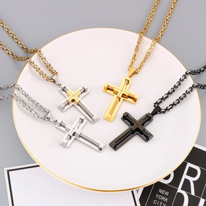 Set of four men's stainless steel cross necklaces in gold, silver, black, and two-tone finishes