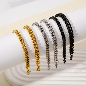 Detailed display of six Cuban link bracelets in gold, silver and black finishes
