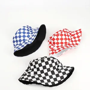 Reversible bucket hats with checkerboard pattern in blue, red, and black color options