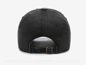 Detail of adjustable metal buckle and vintage washed fabric on the back of the baseball cap