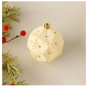 Detail of cream white Christmas ball with geometric texture, gold rhinestones and hanger