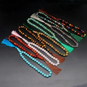 Natural crystal and agate prayer beads bracelet with colorful tassel pendants