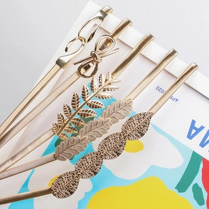 Golden elastic spring waist belt set with butterfly and leaf buckle designs for dresses