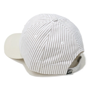 Detail of adjustable metal buckle and striped fabric texture on the baseball cap