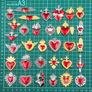 Assorted red enamel heart charms in gold and silver finish for DIY jewelry making