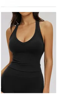 Close-up of women black racerback sports bra featuring a deep V-neck and slim-fit cut