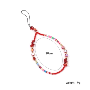 Detailed view of handmade beaded phone strap with red beads, 28cm length and 9g weight