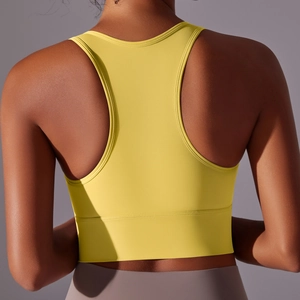 Detail of racerback yoga sports bra in bright yellow with wide elastic support band
