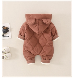 Detailed back view of a brown quilted baby romper with bear ears and warm fleece lining