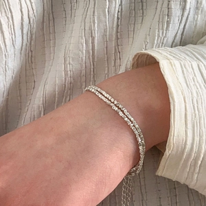 Elegant s925 sterling silver double-layer crushed silver bracelet on female wrist
