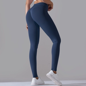 Detail view of seamless high waist yoga leggings with curved seams for butt lifting effect