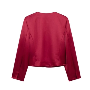 Rear view of elegant red satin top with large festive bow detail on the back