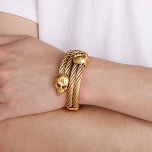 Men's retro gold skull twisted cable cuff bracelet in high polished stainless steel