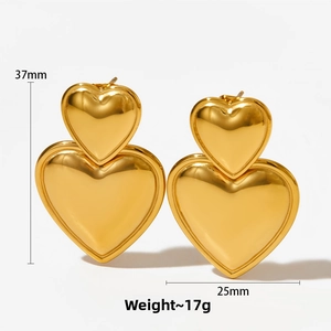 Detailed view of polished heart earrings with dimensions 37mm by 25mm weighing 17g