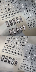Macro view of gothic M-1221 embossed nail stickers with 3D ghost and punk heart motifs