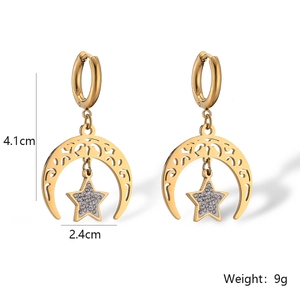 Detail shot of gold star and crescent moon earrings with 4.1cm height measurements
