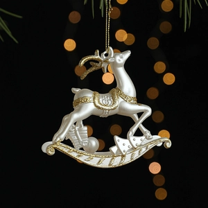 Décoration de Noël renne à paillettes dorées avec finition blanc perle pour les fêtes