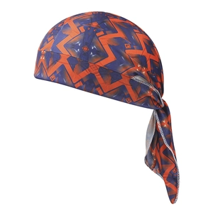 Close-up of orange and blue geometric paisley pattern on a breathable sports bandana