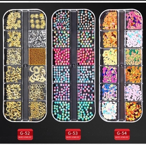 Three 12-slot boxes of nail art charms with golden shapes and iridescent sequins