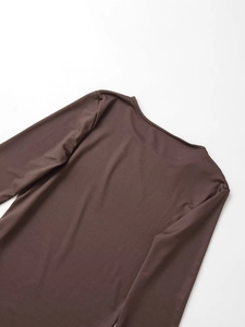 Detail of boat neck and pleated shoulder seam on dark brown long sleeve cotton T-shirt