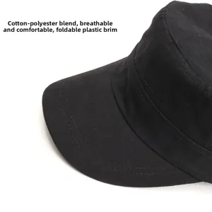 Detail view of the black flat-top military cap showing flexible brim and neat stitching