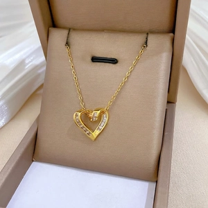 Titanium steel heart pendant necklace with brilliant zircon inlay in a brown gift box