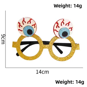 Close-up of Halloween glitter glasses featuring spooky bloodshot eyeballs and gold frame