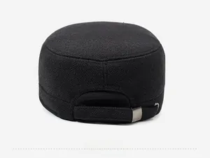 Detail view of the adjustable rear metal buckle and wool fabric on the winter flat cap