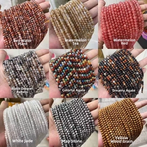 Detailed grid of assorted natural stone beads including agate marble and jasper textures