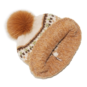 Close-up of thick knitted beanie with Fair Isle pattern and large brown faux fur pompom
