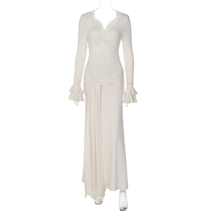 Detail of beige lace V-neck dress featuring elegant ruffle sleeves and waist tie design