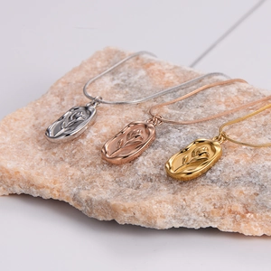 Irregular stainless steel tulip pendant necklace in silver, rose gold, and gold colors