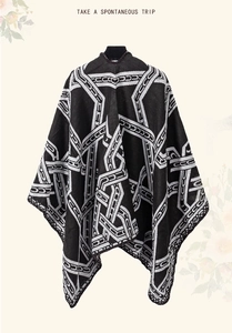 Retro ethnic style warm shawl poncho with geometric black and white patterns for travel