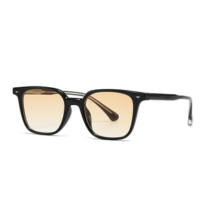 Retro black square sunglasses with orange gradient lenses and metal rivet accents