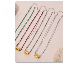 Detailed view of colorful 3mm cubic zirconia necklaces with gold cylinder pendants