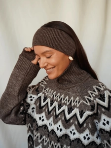 Close-up of Fair Isle knit sweater texture and matching brown knitted headband