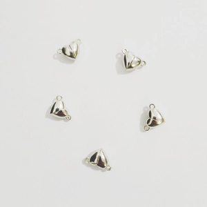 Close-up of heart-shaped magnetic jewelry clasps in polished silver finish, set of 5