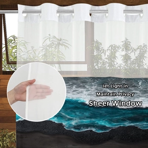 Sheer white shower curtain with beach wave print and metal grommets for light and privacy