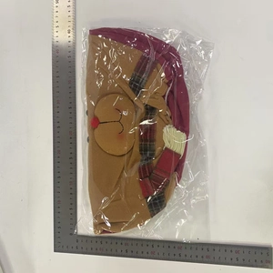 Detailed view of Christmas reindeer plush cover with red plaid ribbon measuring 28cm