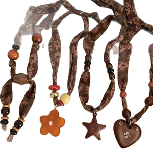 Ethnic wood bead star pendant necklace set with floral fabric cord for women