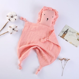Pink muslin cotton baby security blanket with 3D lion head and knotted corners