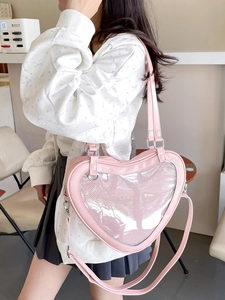 Pink heart-shaped Ita bag in PU leather with clear window and adjustable strap