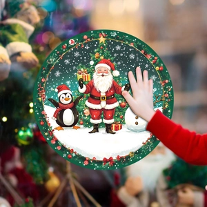 Detail of round Christmas window sticker featuring Santa and snowman for festive home decor