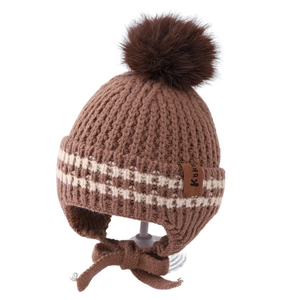 Brown knitted baby winter hat with fur pom-pom, ear flaps, and secure chin straps