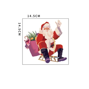 Detail view of Santa Claus on a sleigh sticker with dimensions 14.5cm x 14.5cm