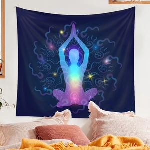 Deep blue yoga meditation tapestry featuring a colorful glowing chakra silhouette for wall decor
