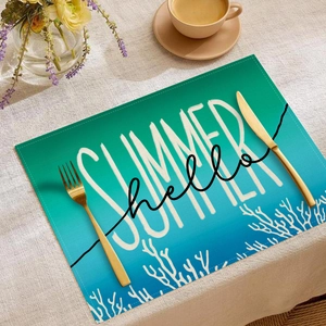 Detail of linen summer place mat with blue coral pattern and SUMMER hello typography